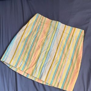 Multi colored mini pencil skirt in a size 6.